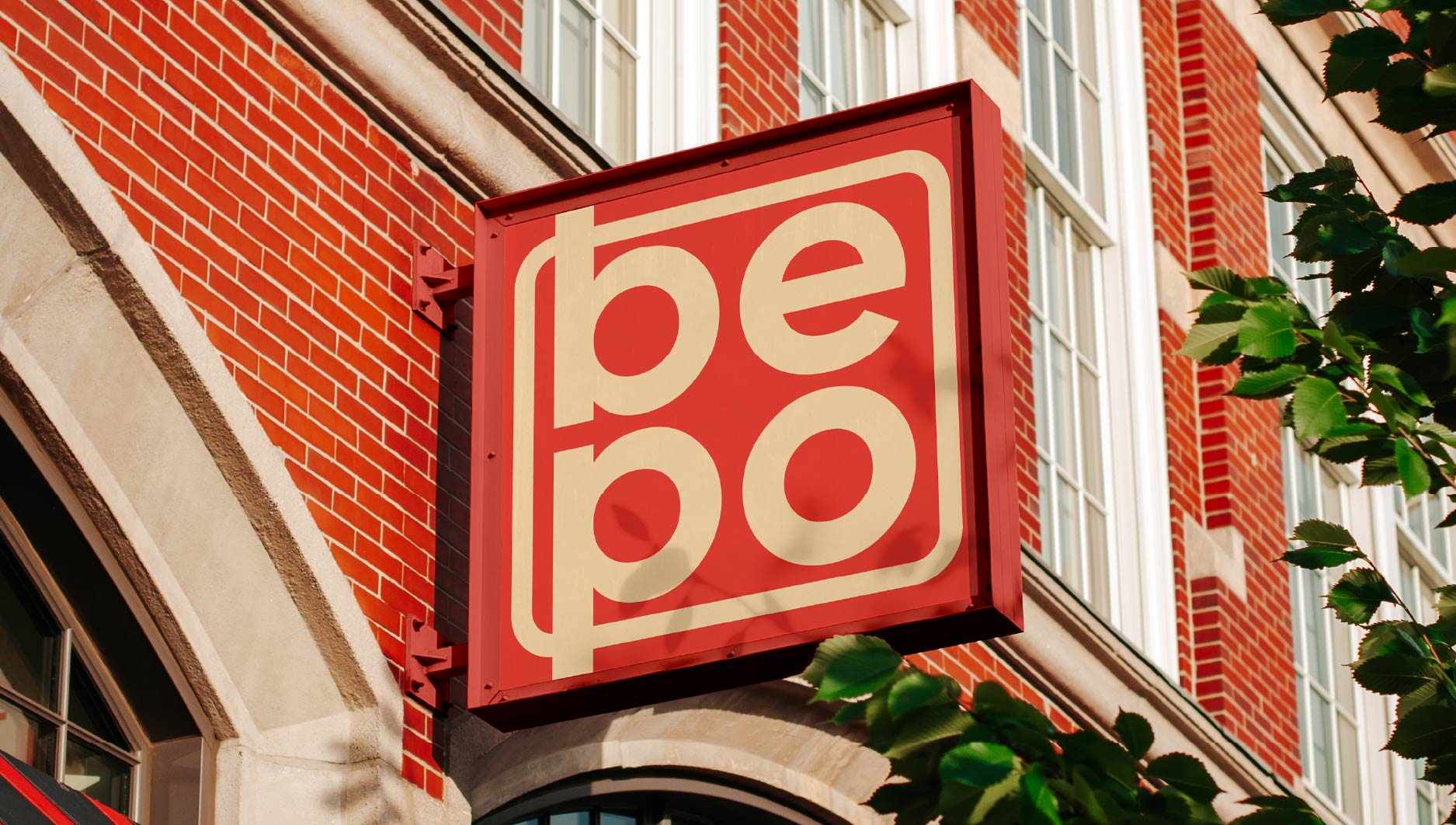 BEPO exterior signage on brick facade